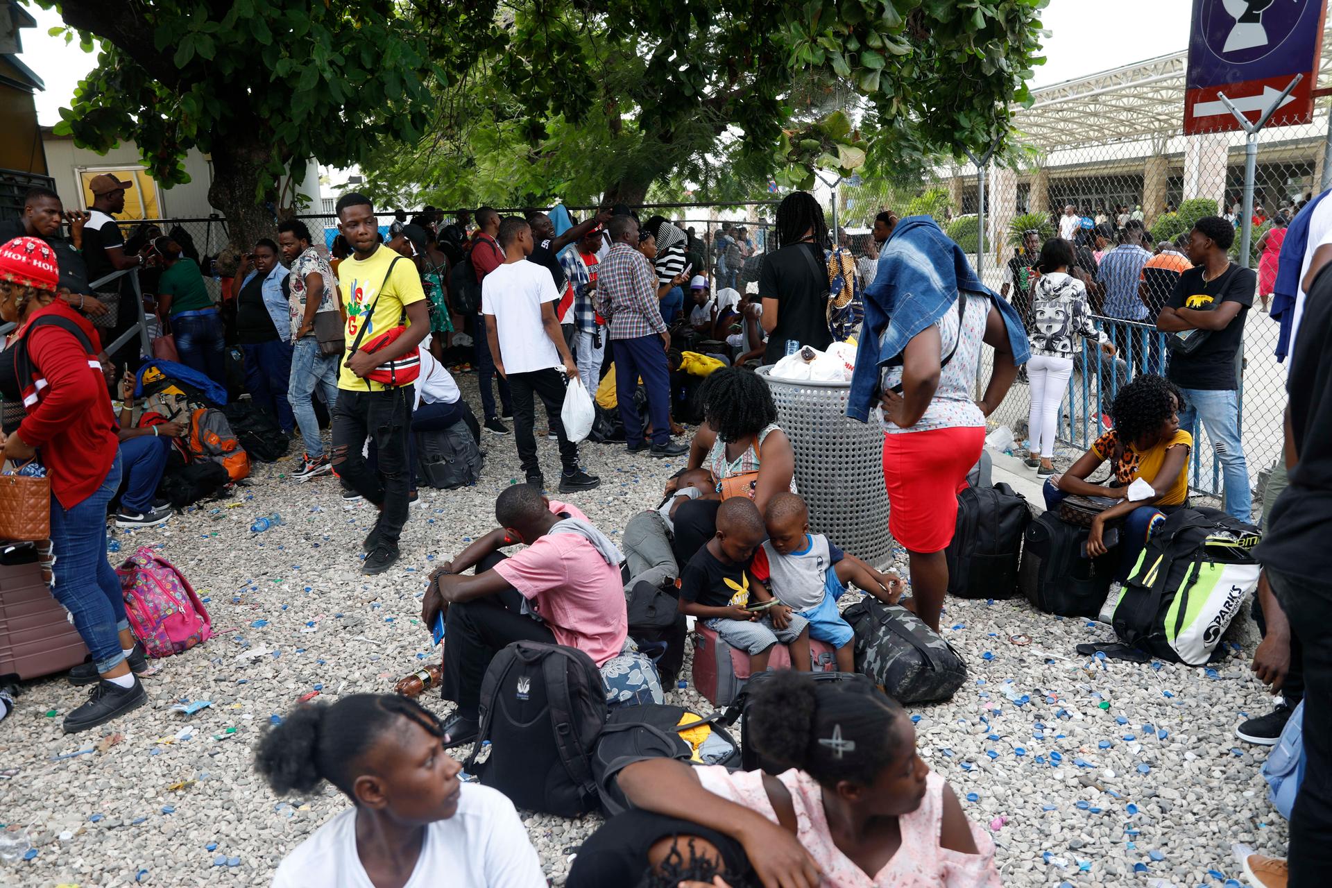Haitians waiting to board a flight to Nicaragua complain after the government banned all charter flights to the country, at Toussaint Louverture International Airport in Port-au-Prince, Haiti, Oct. 30, 2023.