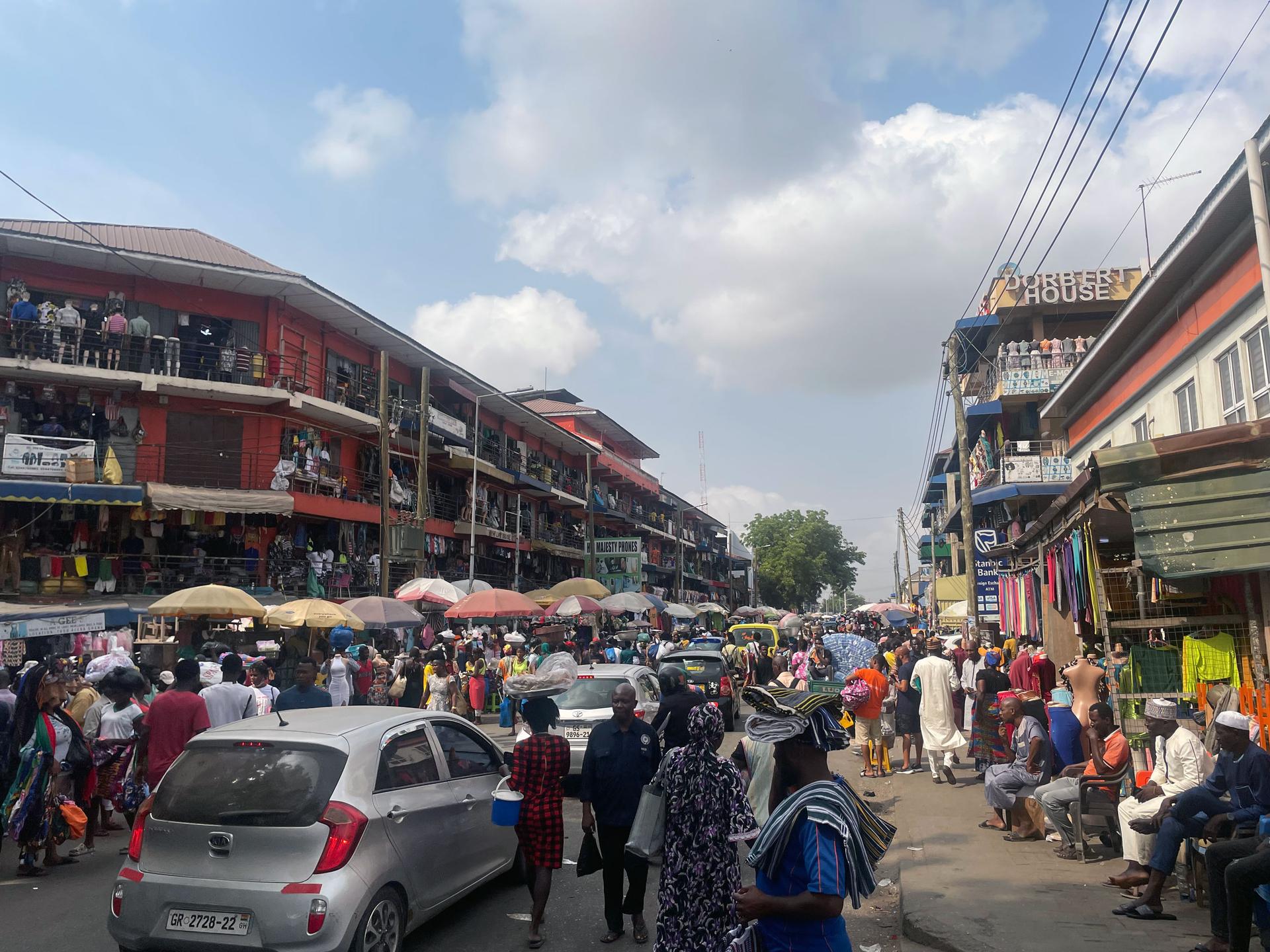 This is a busy scene from the central business district in Accra, Ghana.