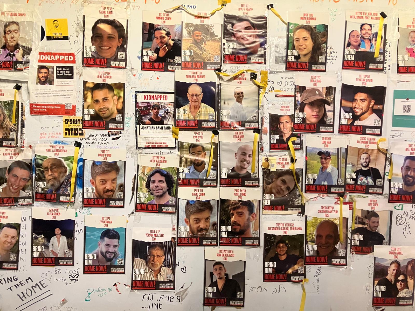 Photos of Israeli hostages kidnapped by Hamas on Oct. 7 are plastered in 
