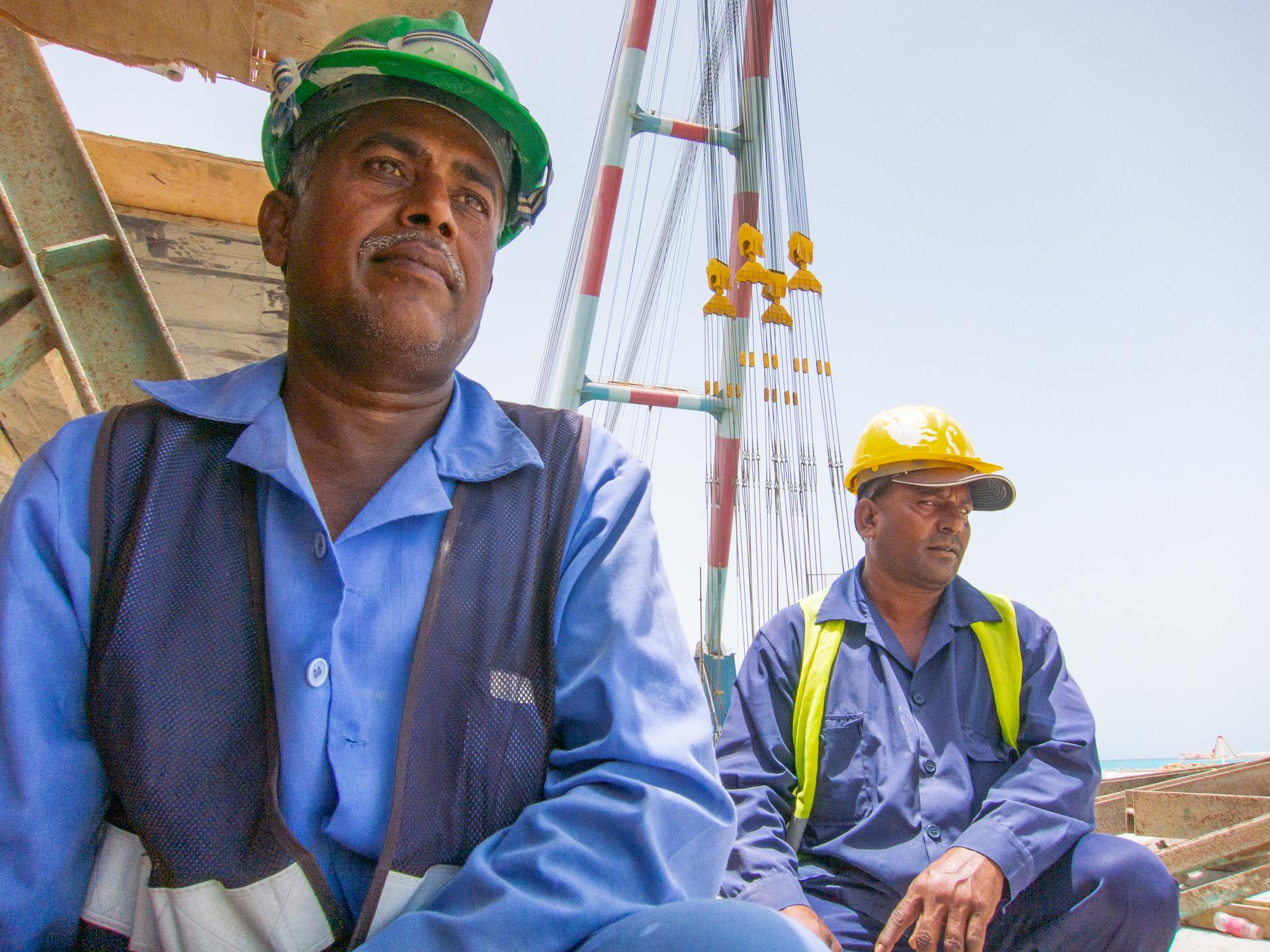 Construction engineers from Pakistan are among the thousands of workers building a metropolis in the desert. Join the journey at outofedenwalk.org.