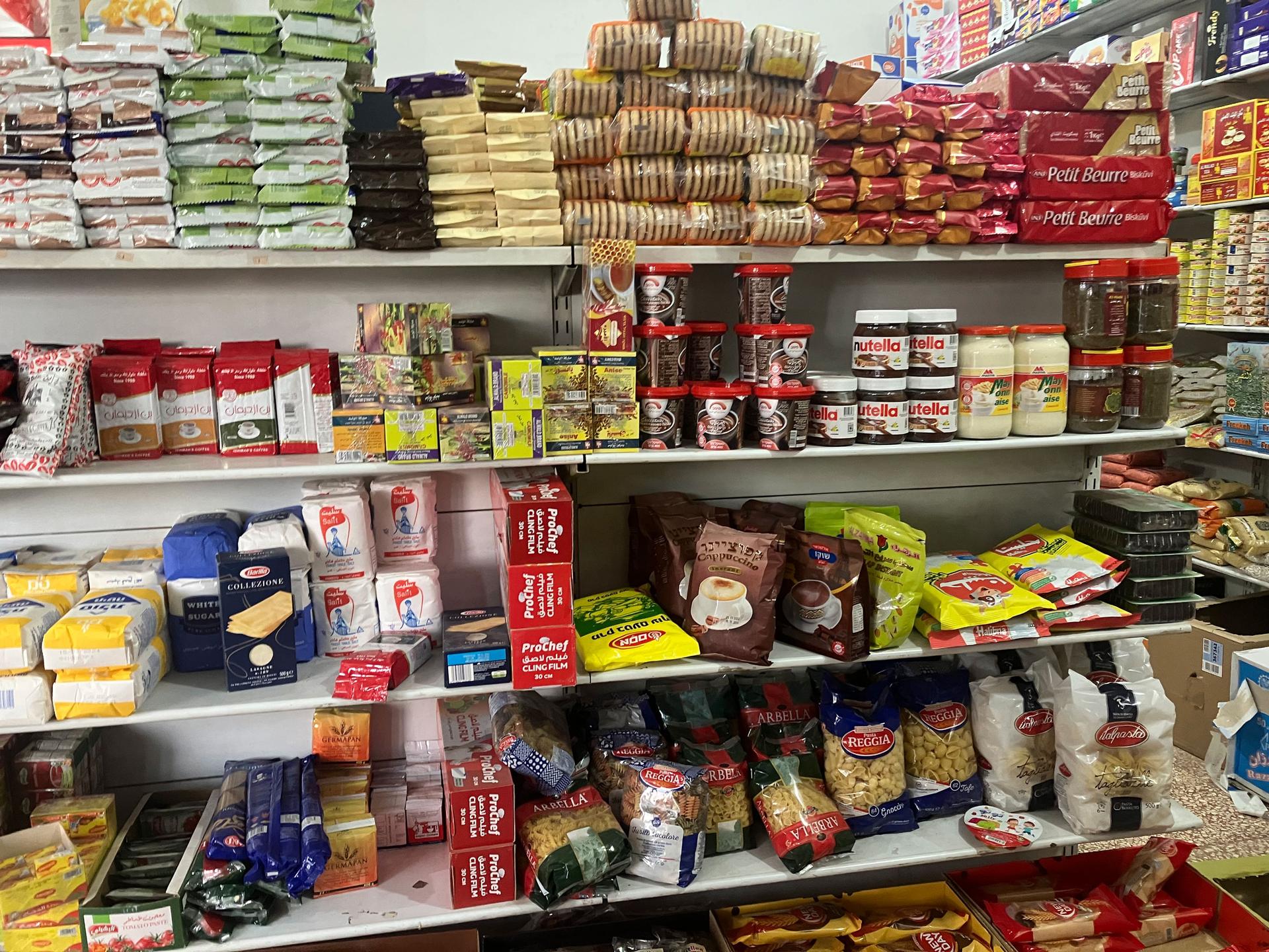 A corner shop in Ein Arik is feeling the pinch as thousands of residents are out of work after Israel banned Palestinians from entering the country.