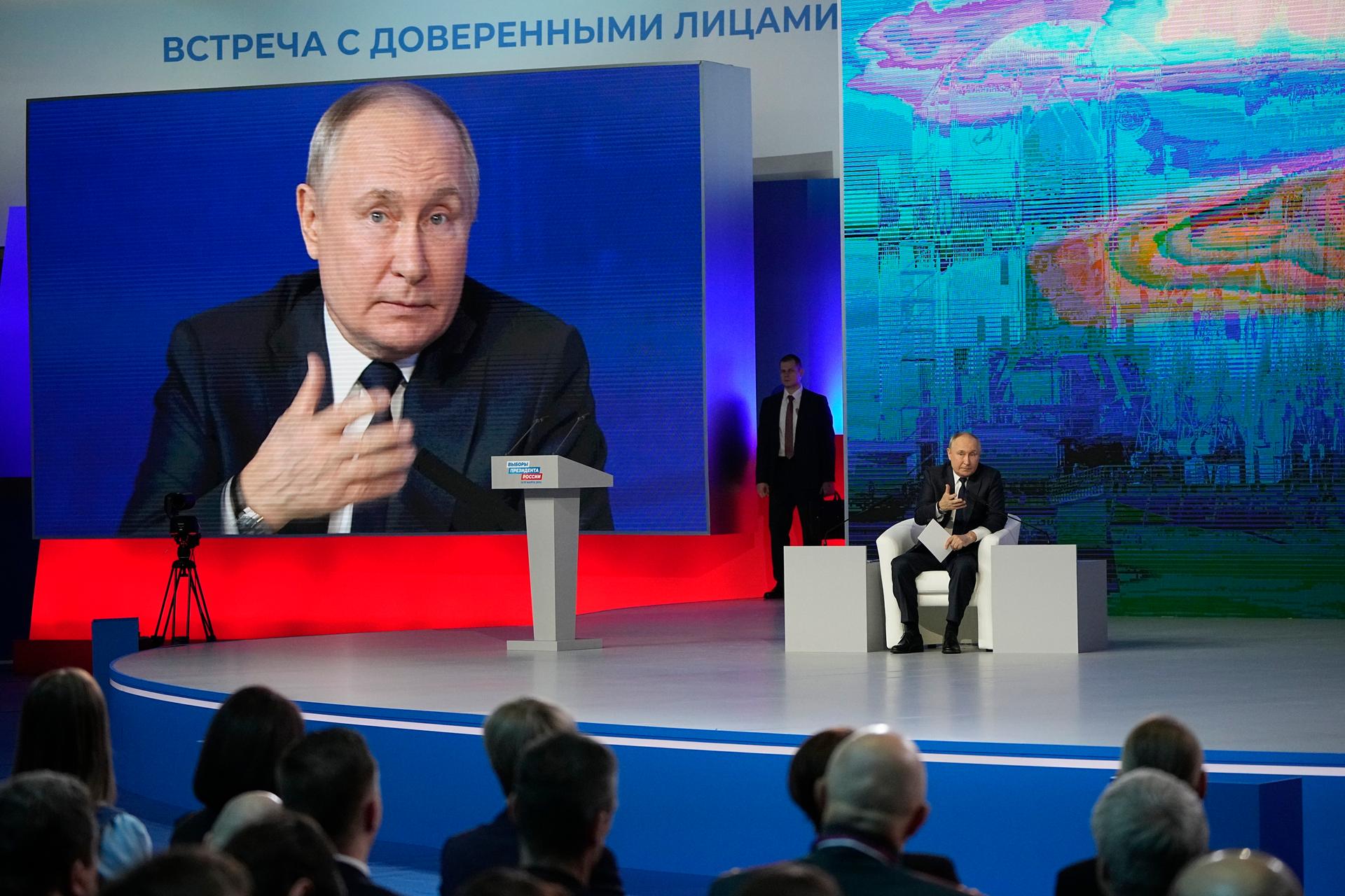 Russian President Vladimir Putin attends a meeting with his election campaign activists in Moscow, Russia, Wednesday, Jan. 31, 2024. Presidential elections are scheduled in Russia for March 17.