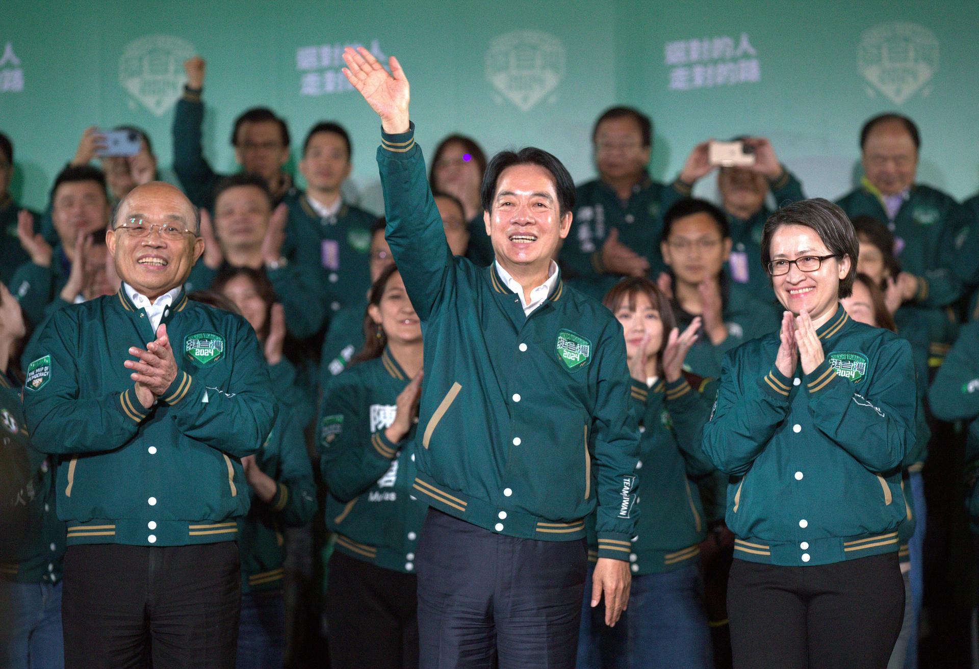 Taiwanese Vice President Lai Ching-te, also known as William Lai, center, celebrates his victory with running mate Bi-khim Hsiao, right, and supporters in Taipei, Taiwan on Jan. 13, 2024.