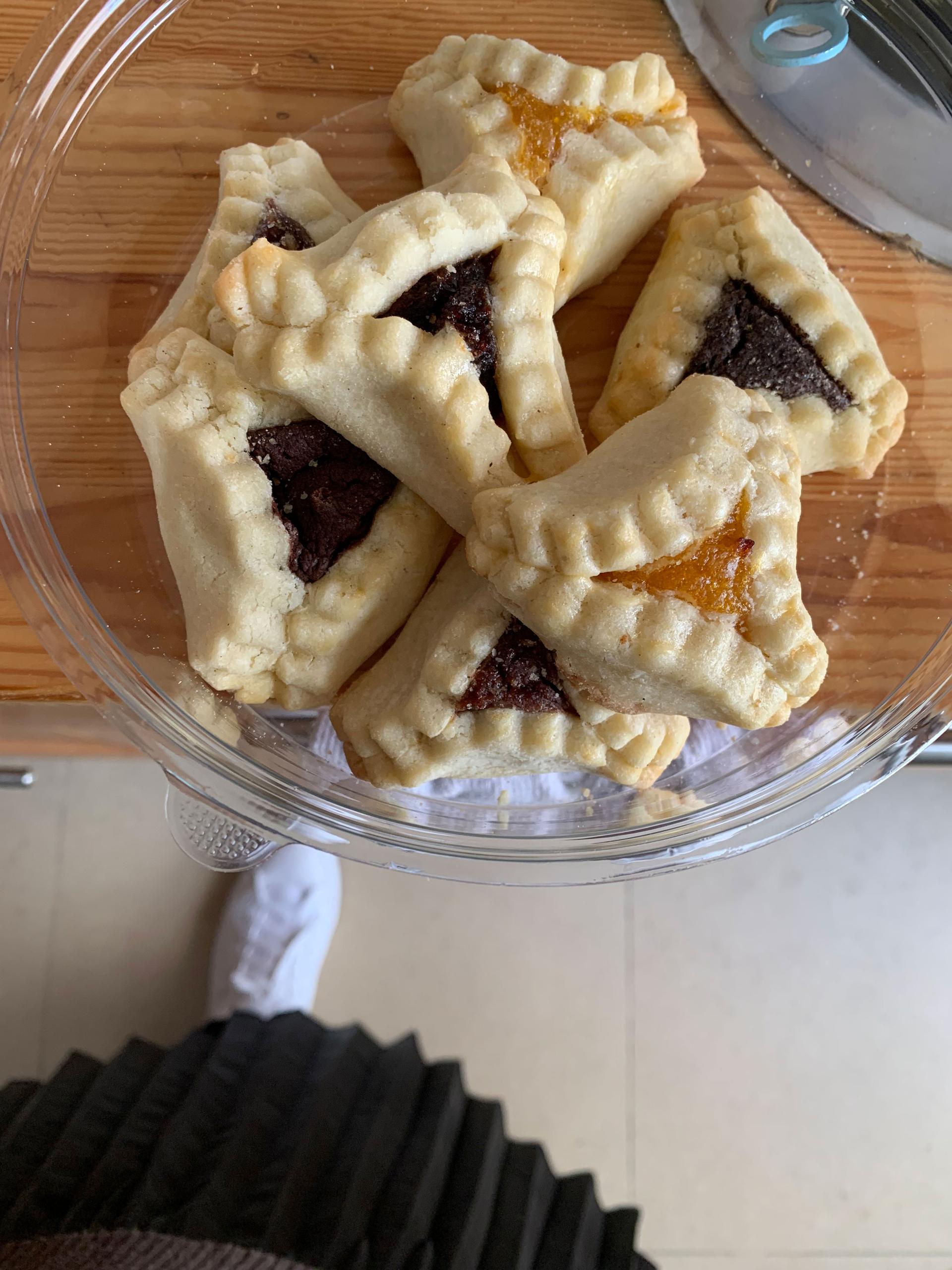 Hamantaschen are traditional Purim cookies, and are said to look like the shape of the villain's three-cornered hat.