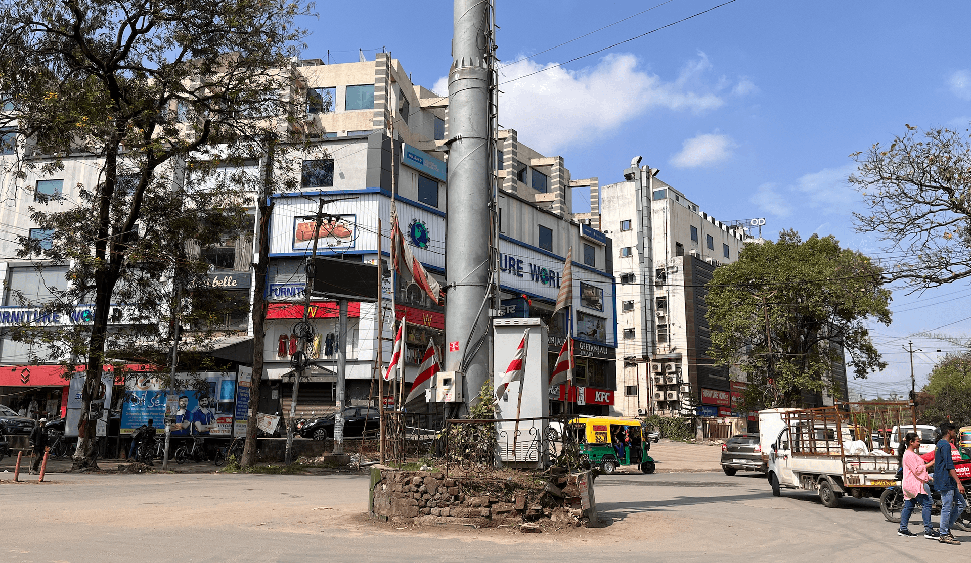 The red-and-white striped flag, a symbol of Adivasi identity, crops up everywhere in Jharkhand, from people's rooftops to traffic circles in the middle of the street.