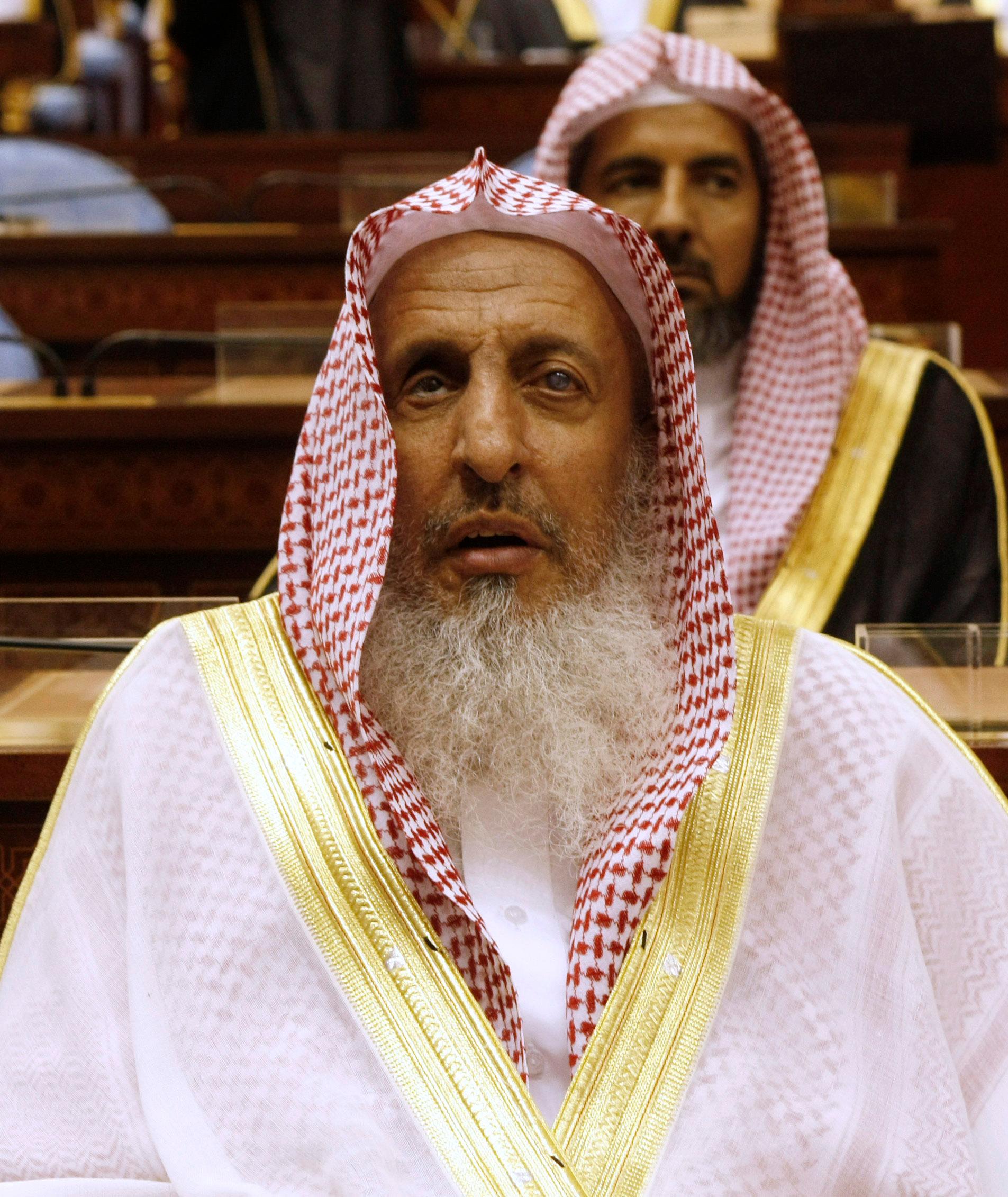 Sheikh Abdul Aziz al-Sheikh, the Saudi grand mufti listens to a speech of King Abdullah of Saudi Arabia at the Consultative Council in Riyadh, Saudi Arabia, March 24, 2009.