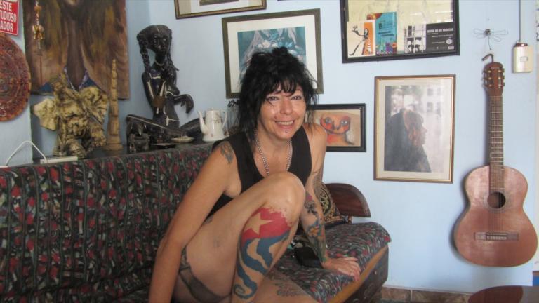 Artist Lisette Padilla, 49, at her apartment in Havana. Since her work has been censored in her home country, she puts on exhibits in Spain and Mexico.