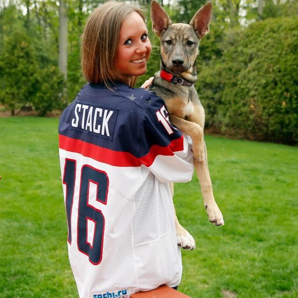 Kelly Stack, ice hockey player for Team USA and 2014 Sochi Olympian with Shayba, a German shepherd mix whose name in Russian means 