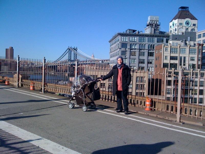 Ahlam and her infant daughter on the Brooklyn Bridge. Ahlam left Syria in late 2012 while pregnant to escape the violence there.