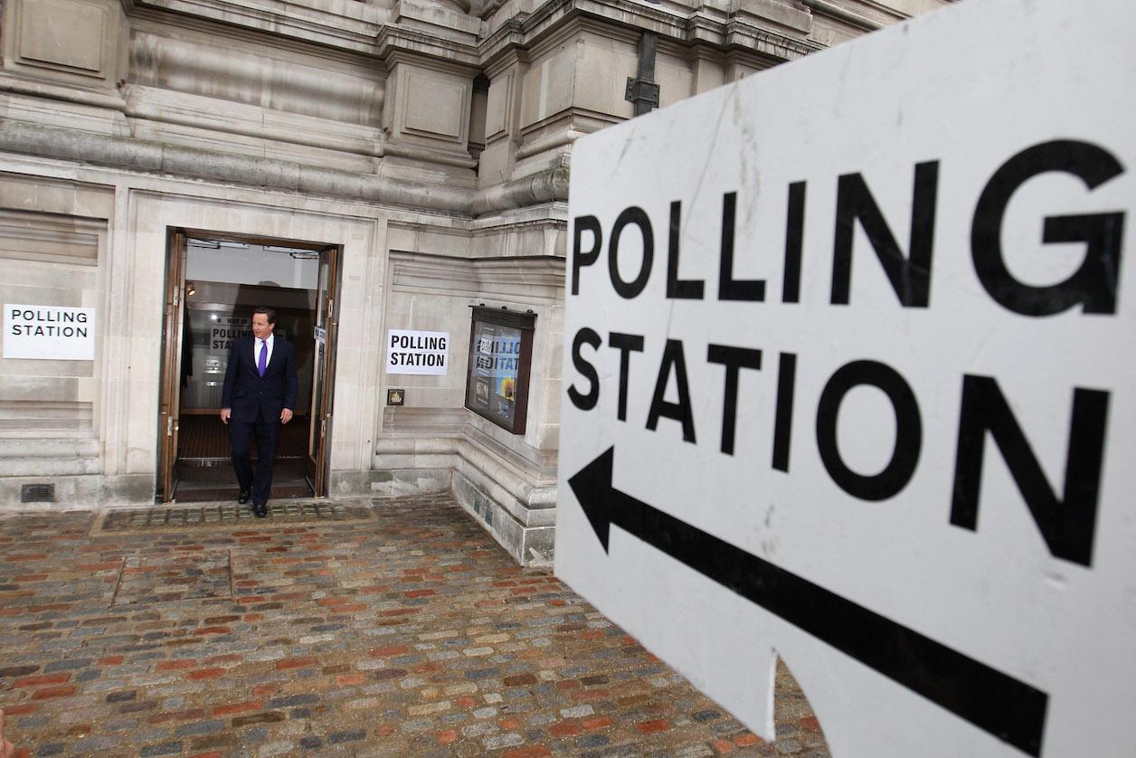 David Cameron walks out of UK polling station