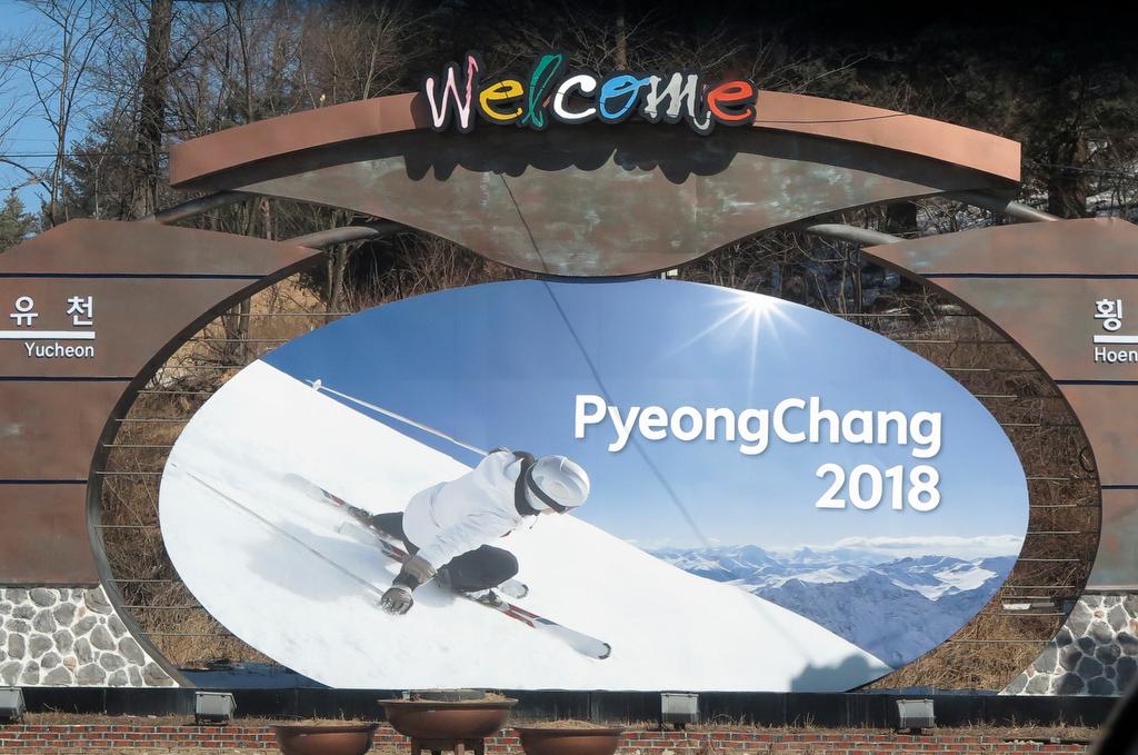 The advertising hoarding promoting the 2018 Winter Olympics stands in the mountain cluster of PyeongChang on Feb. 9, 2015. 