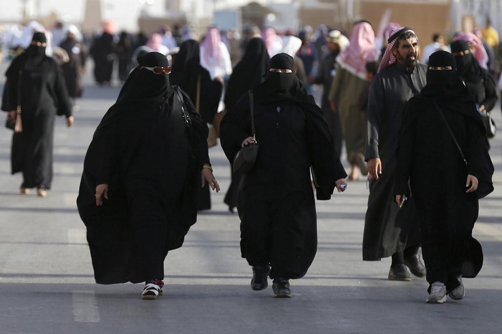 Saudi women arrive to attend Janadriyah Culture Festival on the outskirts of Riyadh, Saudi Arabia, on Feb. 8, 2016.