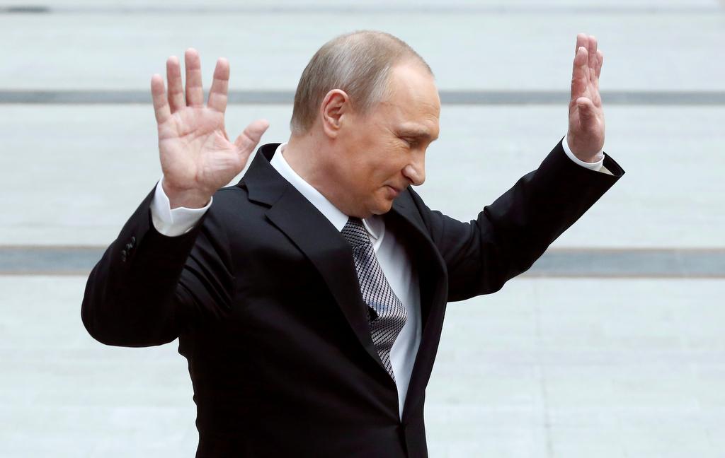 Russian President Vladimir Putin gestures during a meeting with journalists after a live broadcast nationwide call-in in Moscow, Russia, on April 14, 2016.