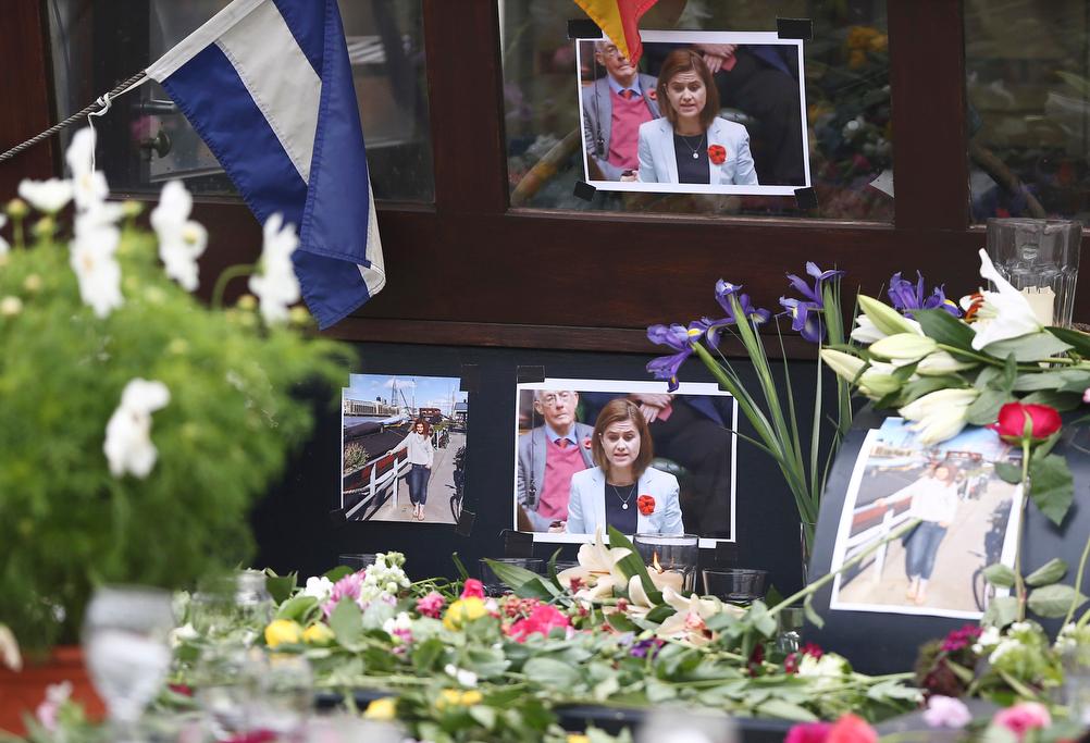 Tributes to Labour Party MP Jo Cox are placed on her houseboat in Wapping in London, Britain June 16, 2016.