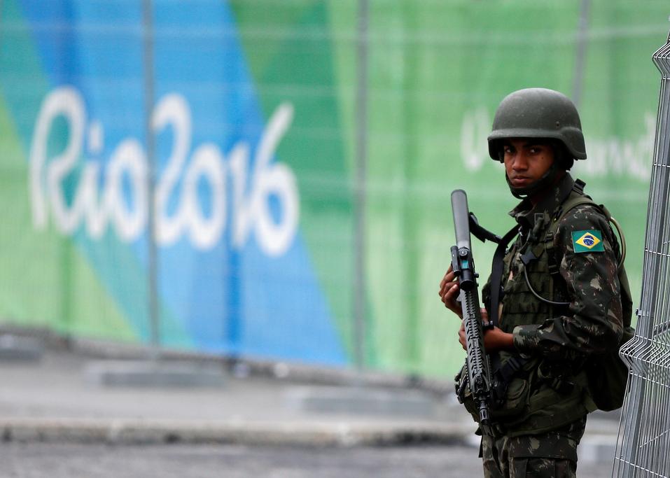 A soldier of the Brazilian Armed Forces stands guard outside the 2016 Rio Olympics Park in Rio de Janeiro, Brazil, July 21, 2016. 