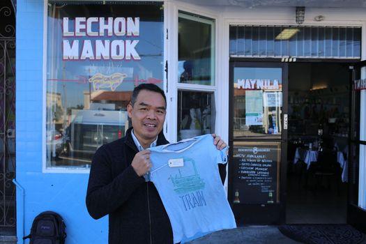 Andrew Lam stands outside the restaurant his aunt and mother onced owned and operated in Daly City, California.