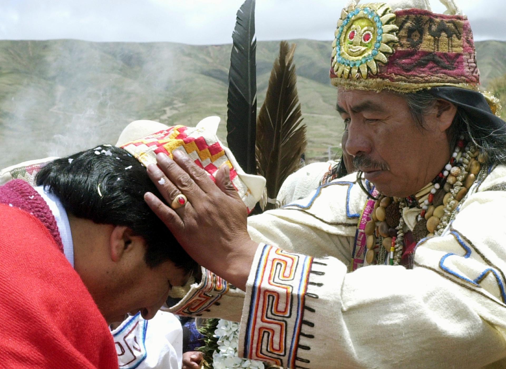 Bolivian President Evo Morales (L) is blessed by Aymara priest Valentin Mejillones during a ceremony at Tiawanaku, a pre-Columbian archaeological site about 40 miles west of La Paz, in 2006. The Aymara people, of which Morales is a member, are the descend