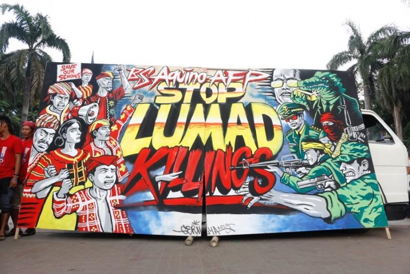 Mural by Ang Gerilya highlighting the call to stop the militarization of ethnic communities in Mindanao.