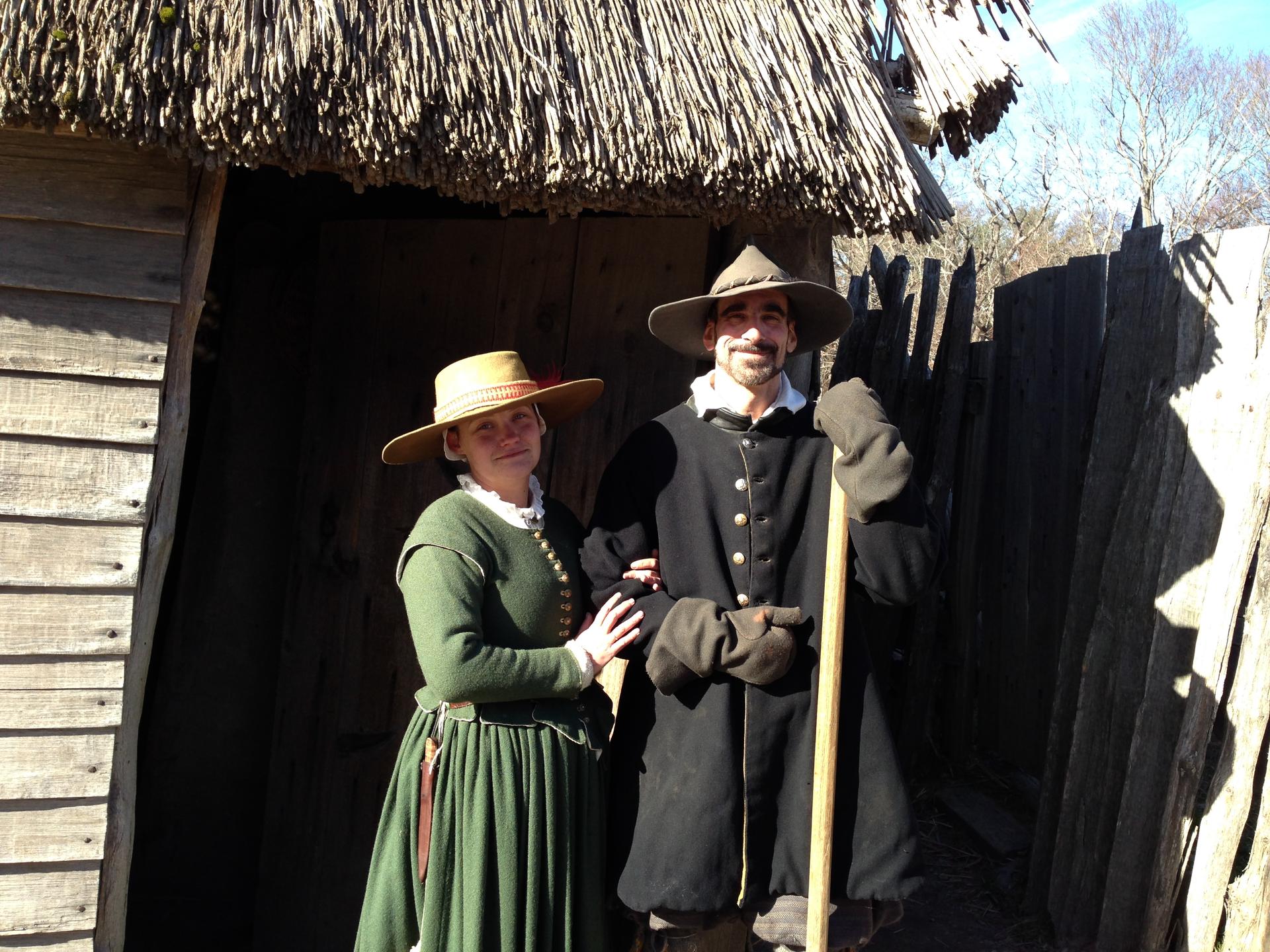 William and Alice Bradford in the doorway to their home. The couple is portrayed by real life couple, Chris and Norah Messier.
