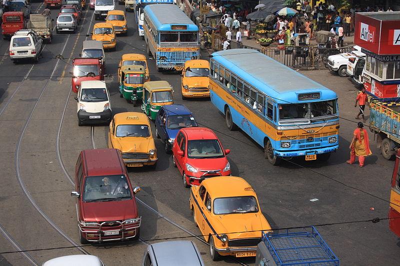 Taxis, buses and other cars stuck in the honking traffic in Kolkata, India