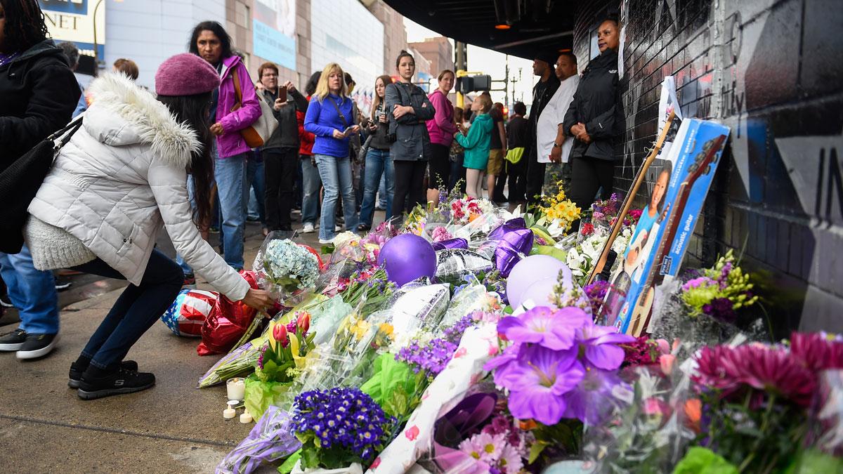 Fans lay flowers and memorials outside First Avenue, the nightclub where Prince got his start in Minneapolis, Minnesota. 
