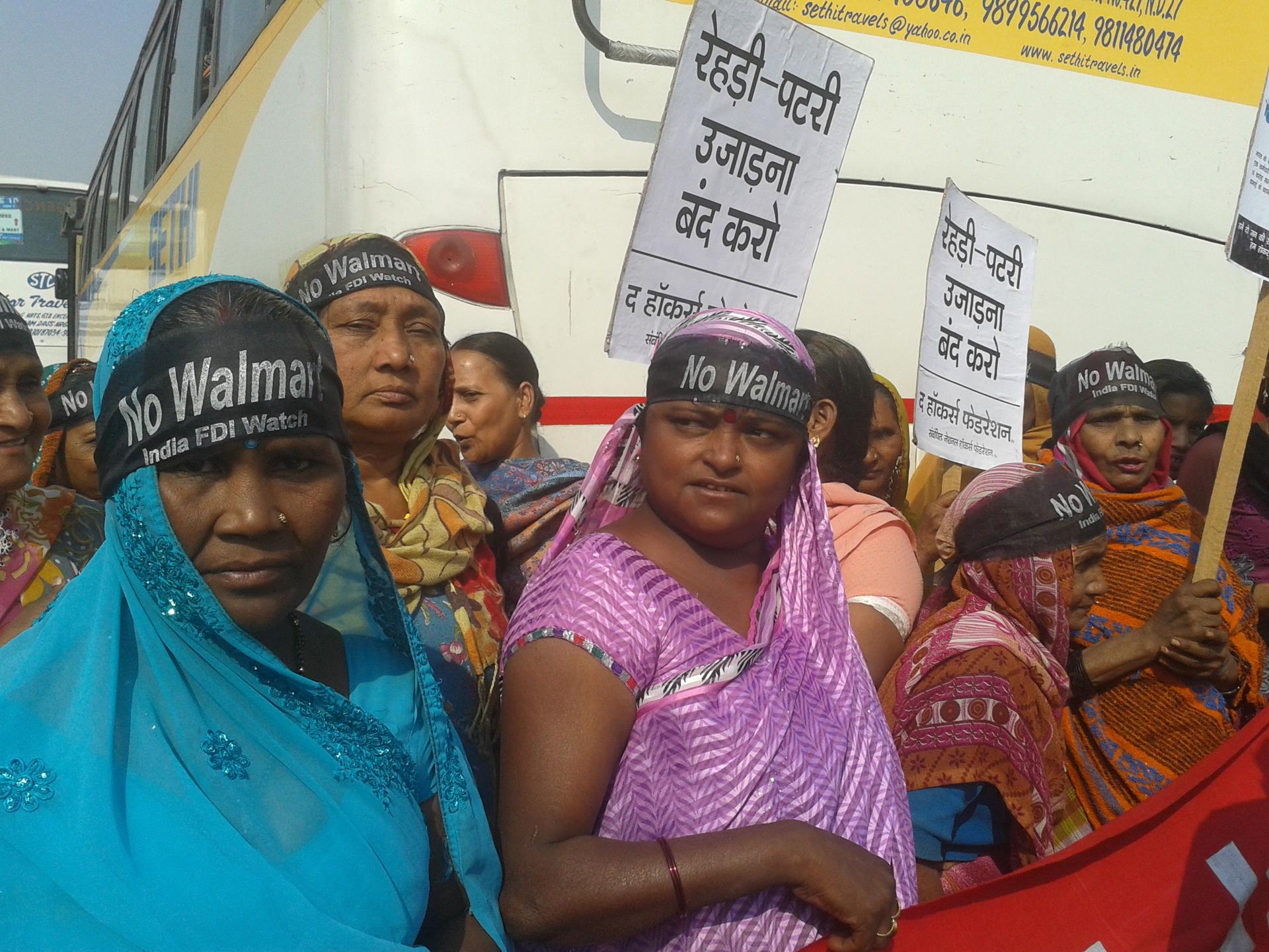 Women wearing "No Walmart" head bands at a protest outside Walmart India offices in Gurgaon, India.