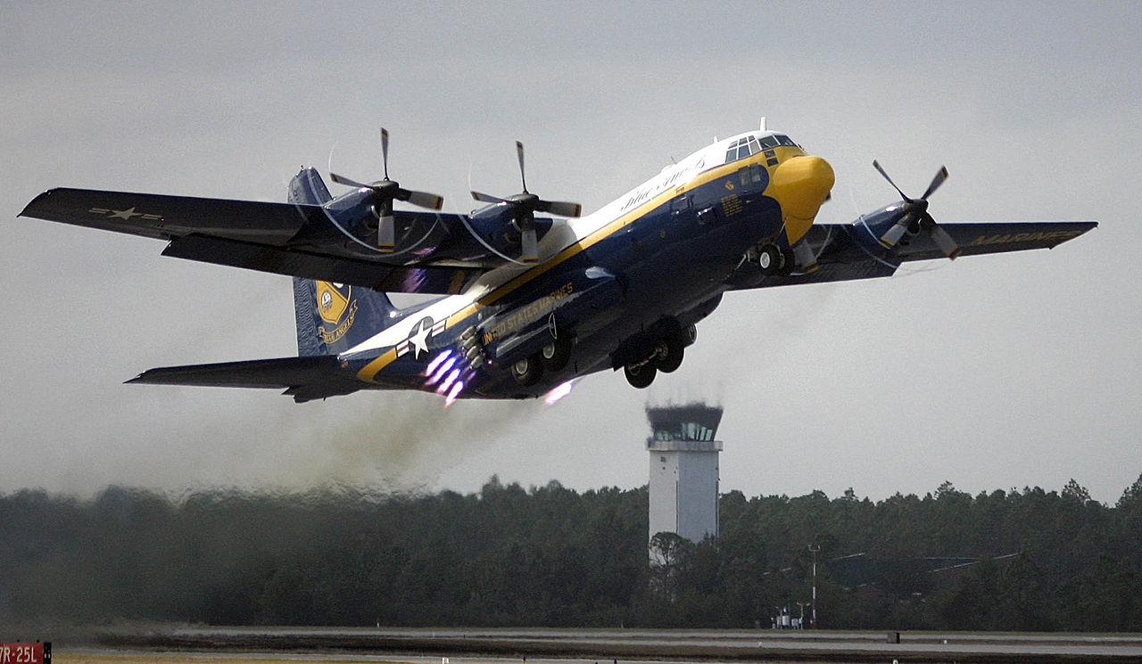 The US Marine Corps C-130 Hercules named "Fat Albert," assigned to the US Navy “Blue Angels” flight demonstration team, uses Jet Assisted Take Off bottles during the 2005 Blue Angel Homecoming show.
