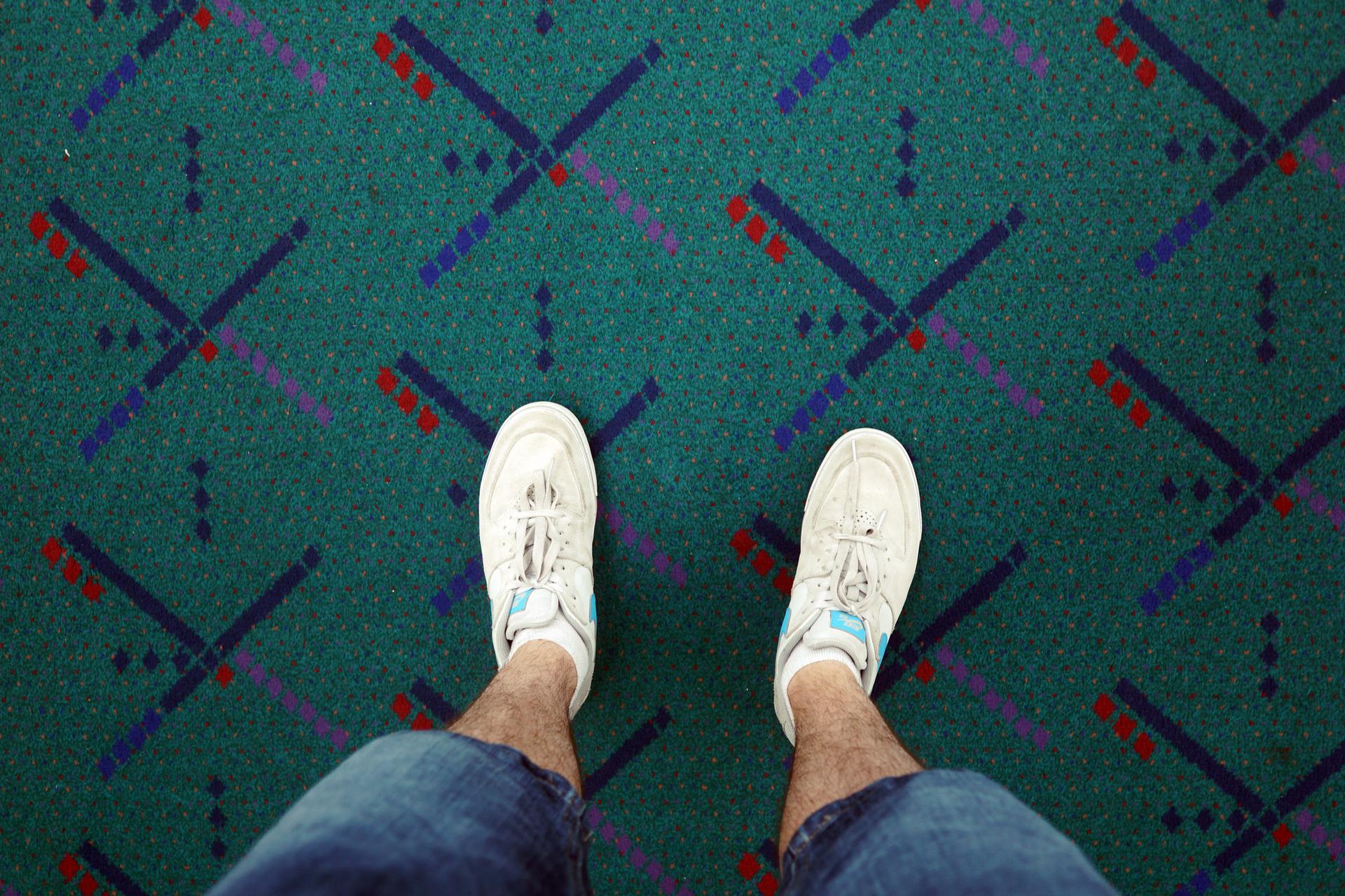Standing on the soon-to-be-removed carpet at Portland's airport.