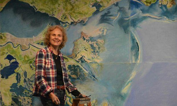 Artist Susan Crile stands with a study for a painting of the BP oil spill in the Gulf of Mexico.
