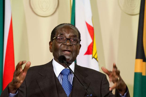 Zimbabwe President Robert Mugabe addresses members of the media