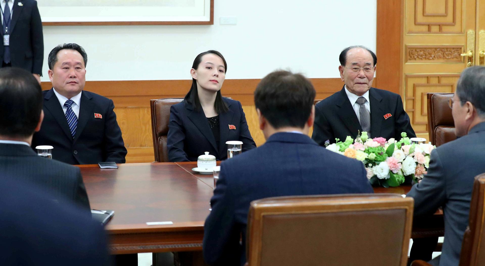South Korean President Moon Jae-in talks with President of the Presidium of the Supreme People's Assembly of North Korea Kim Yong-nam and Kim Yo-jong, the sister of North Korea's leader Kim Jong-un.