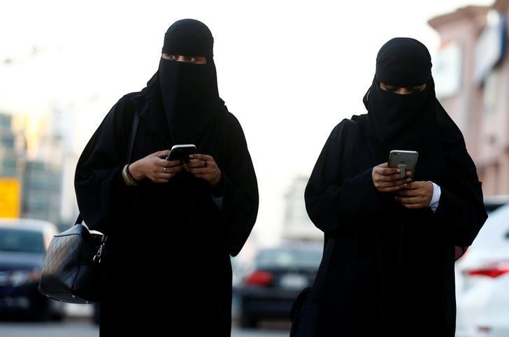 Saudi women use their mobile phones in Riyadh, Saudi Arabia, January 2, 2017.