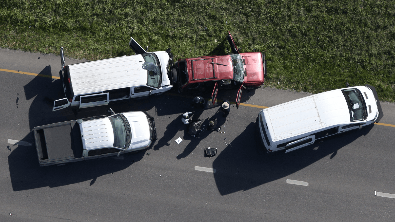 Law enforcement personnel investigate the scene where the Texas bombing suspect blew himself up on the side of a highway north of Austin in Round Rock, Texas, March 21, 2018.