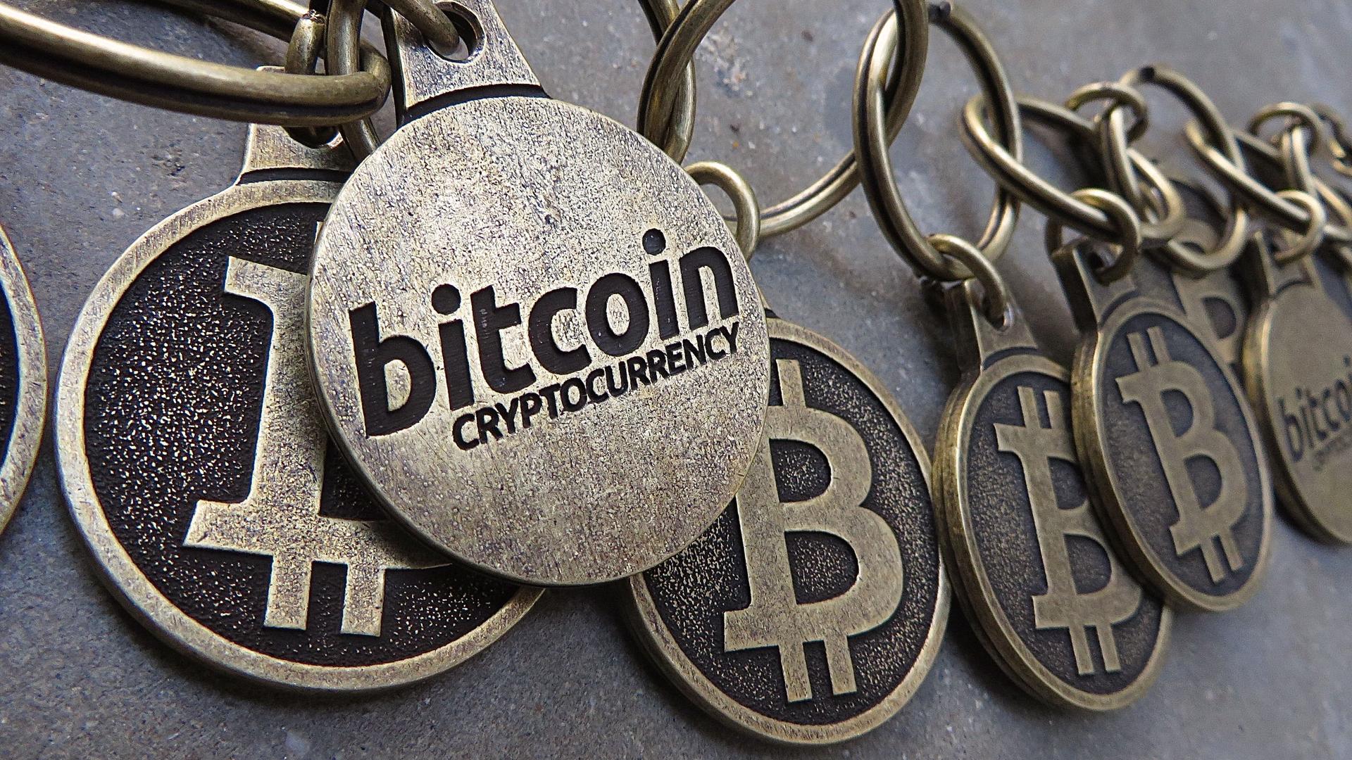 Chain of Bitcoin keychains, symbolizing the Bitcoin Blockchain.