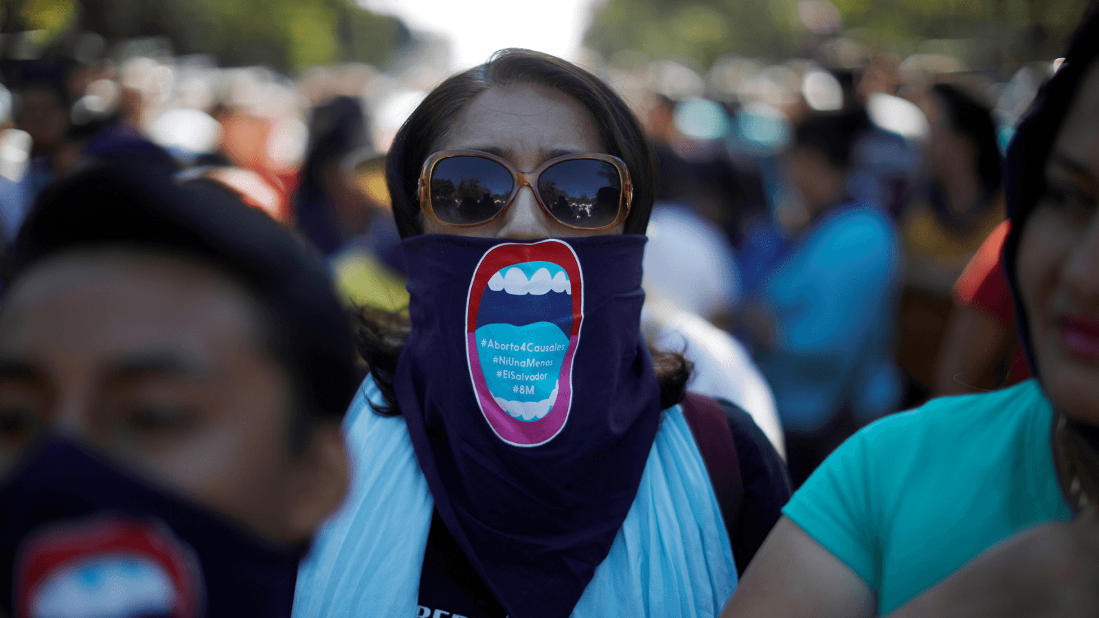 Activists participate in a march to call for an end to violence against women during International Women's Day in San Salvador, El Salvador, March 8, 2018.