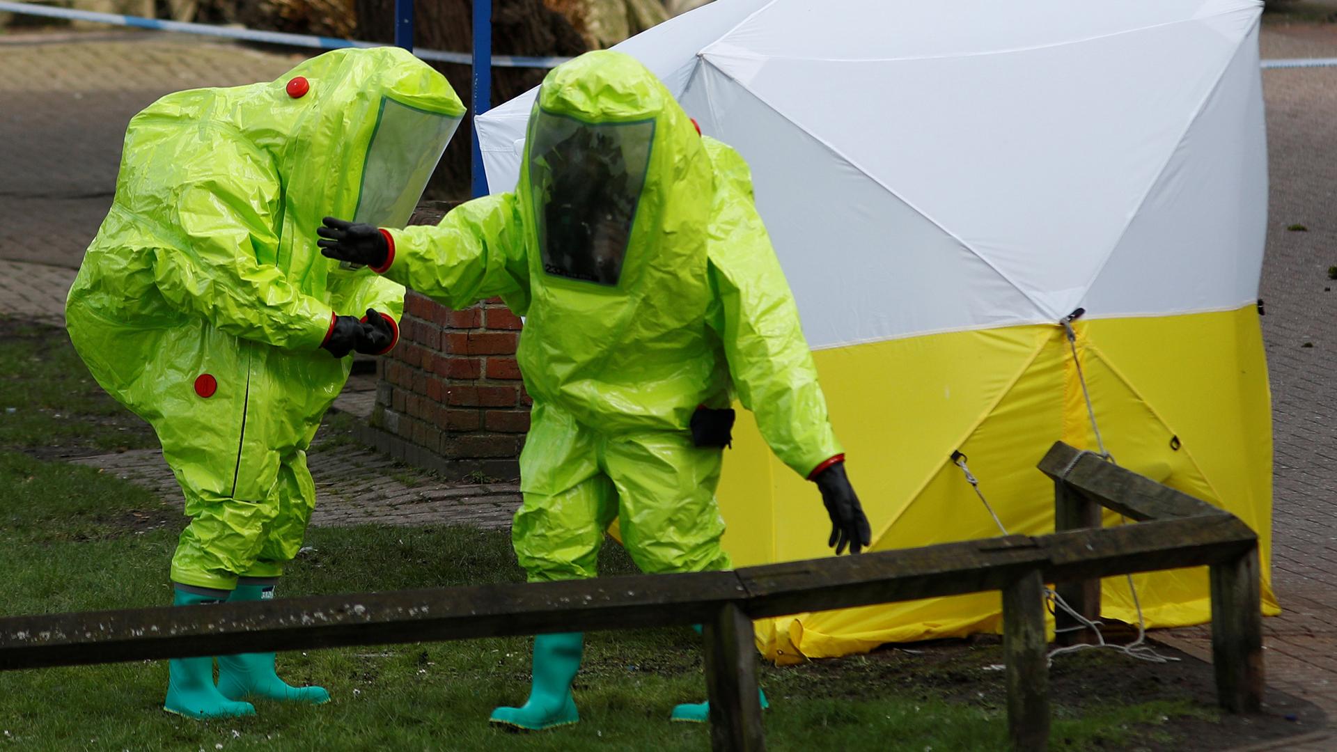 Officials working where Sergei Skripal and his daughter Yulia were found in Salisbury, Britain.