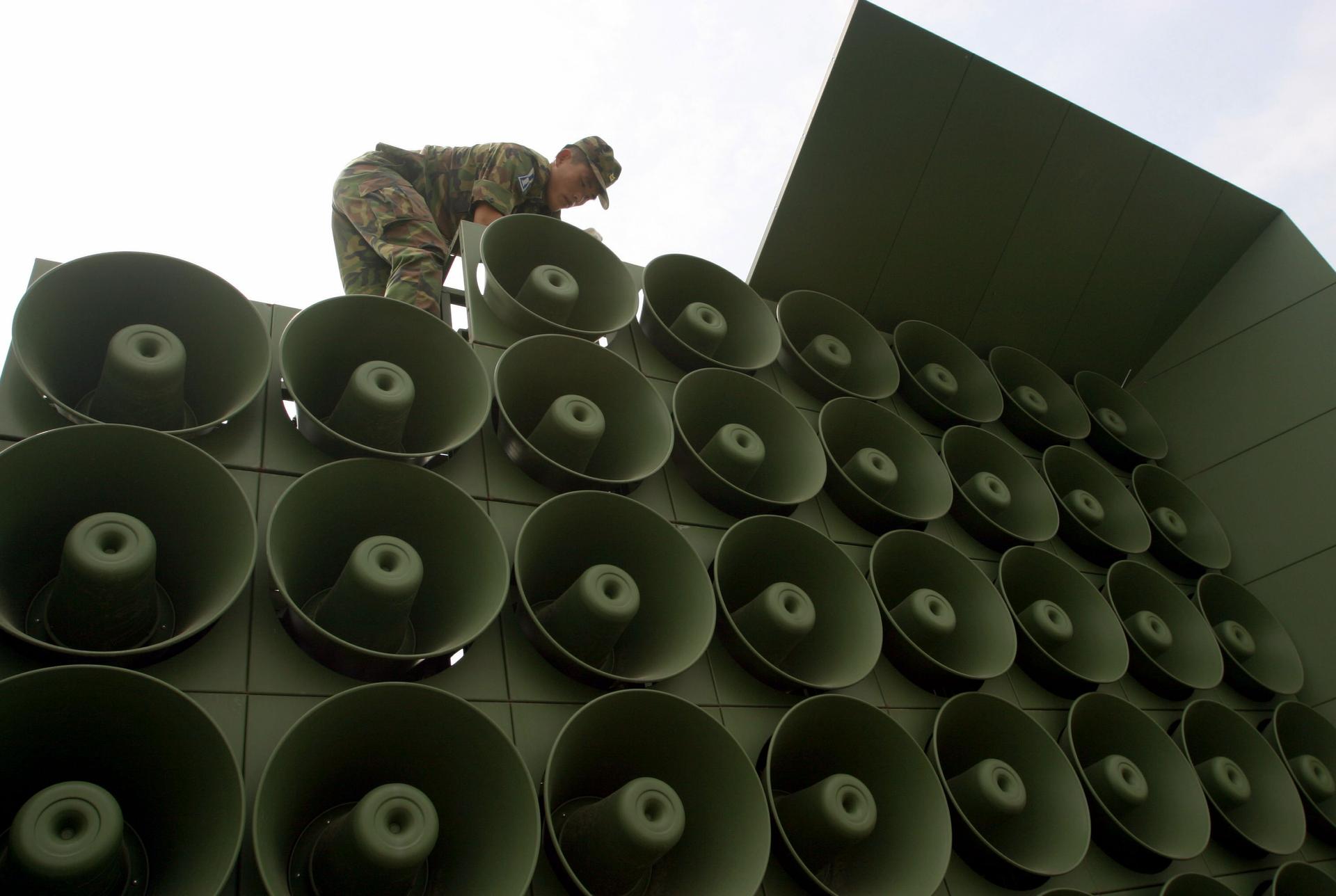 A South Korean soldier works on a stack of loudspeakers used for propaganda purposes near the demiltarized zone.