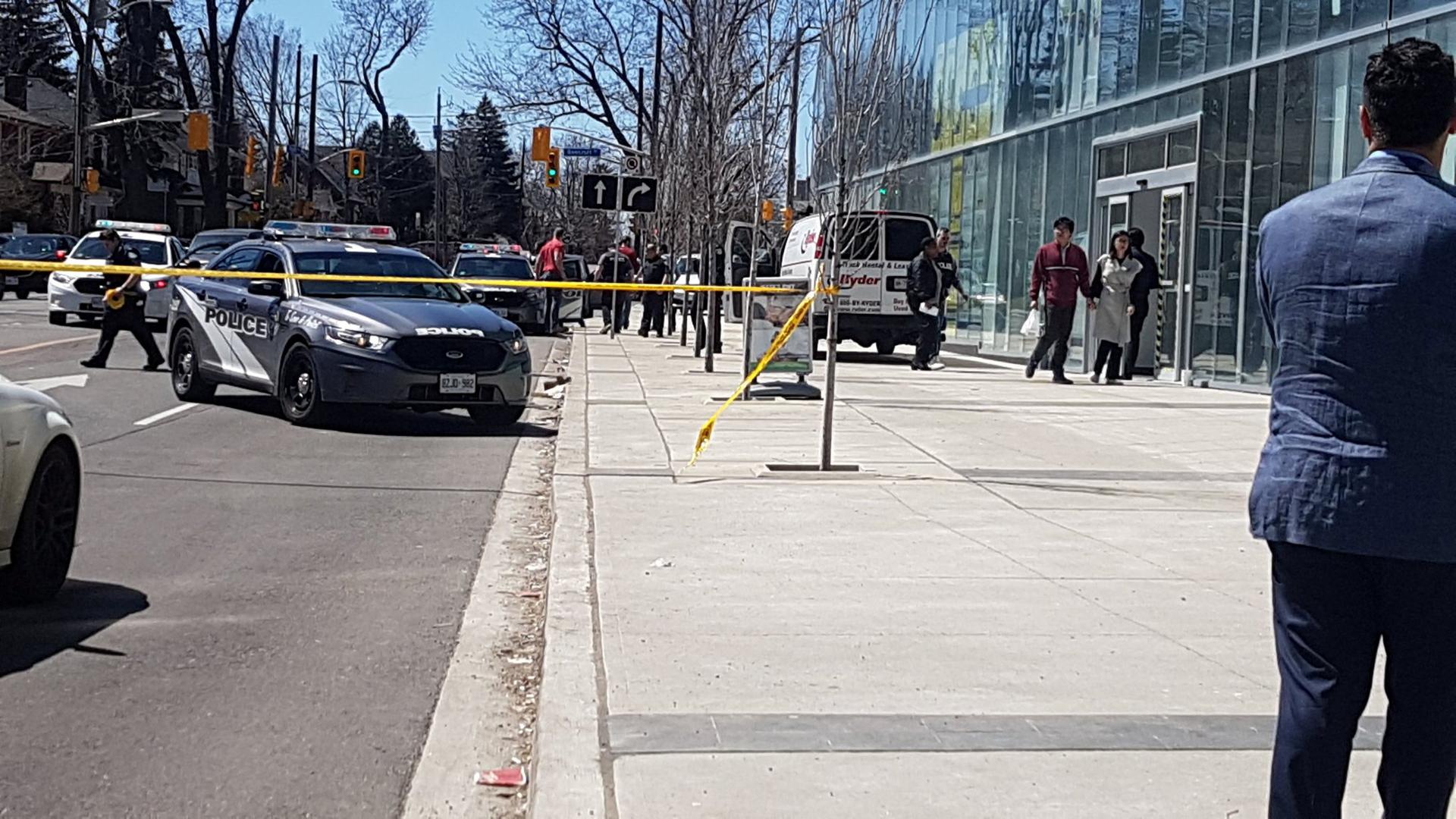 Police officers arrest suspect driver after a van hit multiple people at a major intersection in Toronto, Canada April 23, 2018, in this picture obtained from social media.