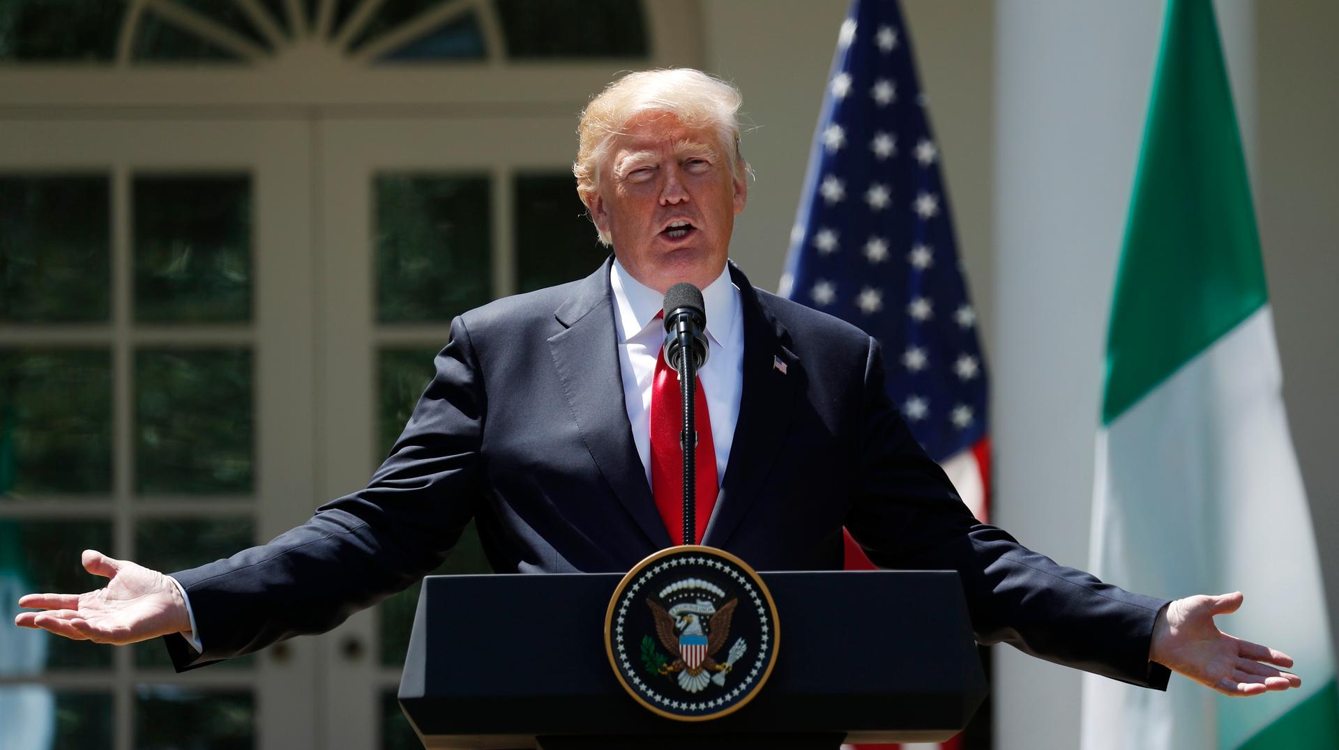 President Donald Trump speaks during a news conference in the Rose Garden of the White House.