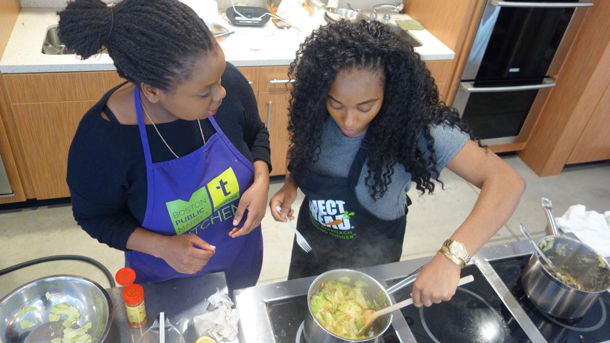 Class instructor Chioma Woko preparing braised cabbage.