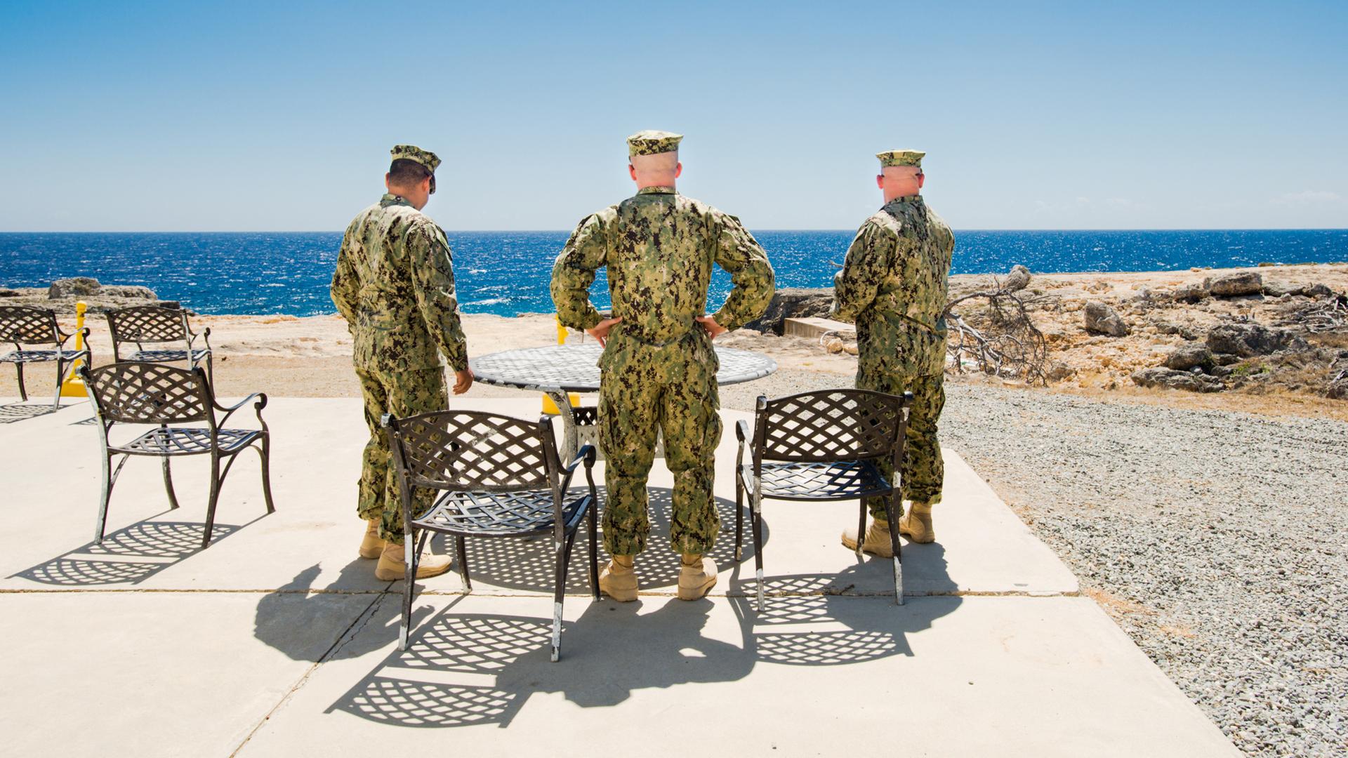 Marines take a smoke break at Camp America, Guantanamo Bay.