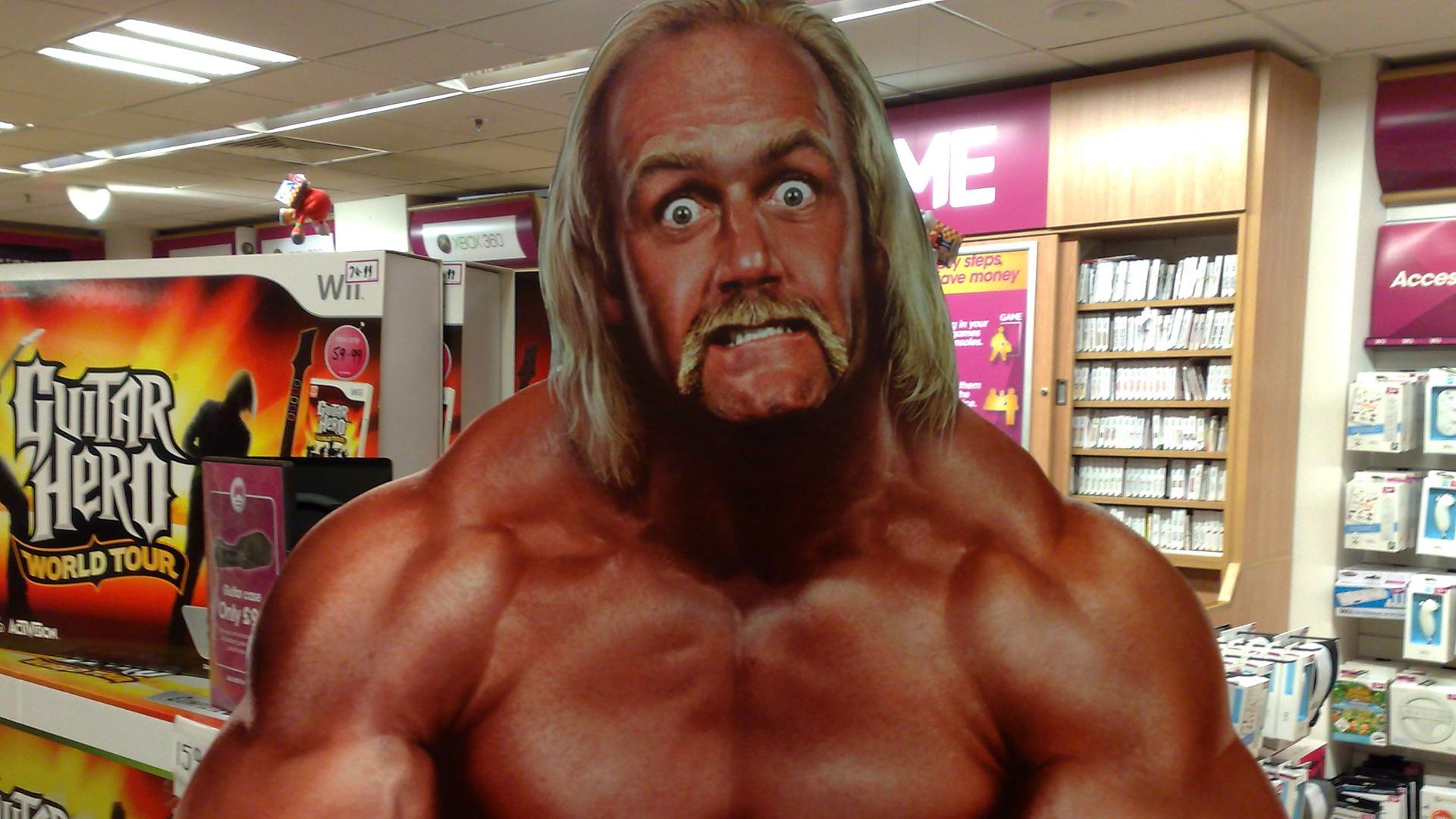 A poster of professional wrestler Hulk Hogan mugging for the camera.