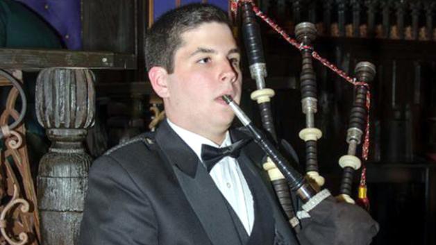 18- year old Campbell Webster playing his father's bagpipes.