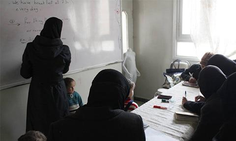 A class at a women's center in Ghouta. 