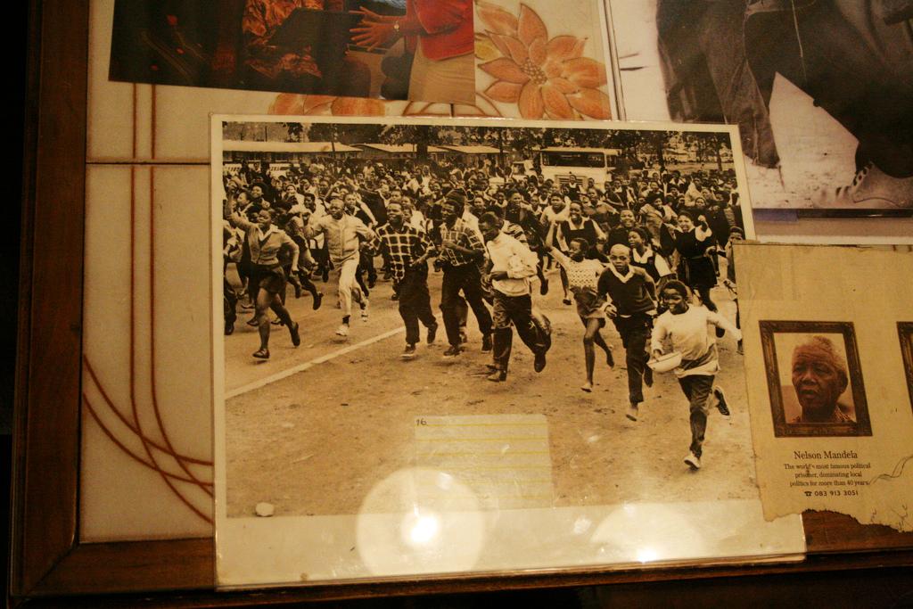 An old photograph of crowd running in Soweto, Johannesburg.