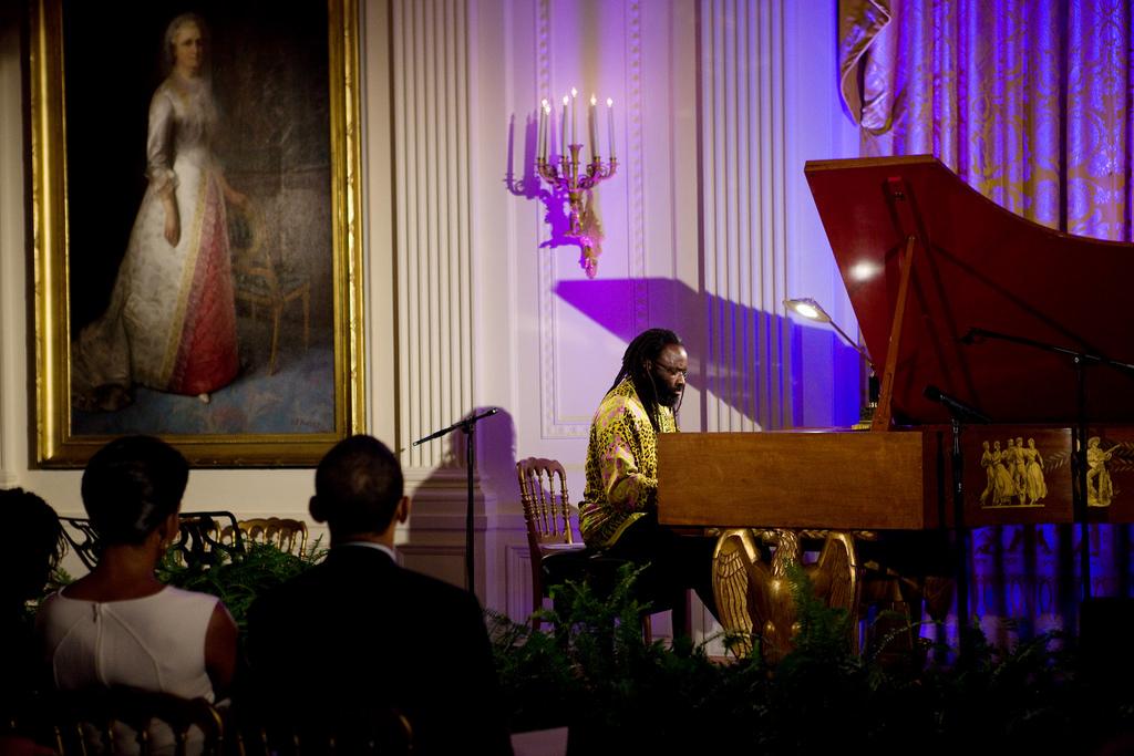 The Obamas listen to pianist Awadagin Pratt perform in the East Room of the White House, in 2009.