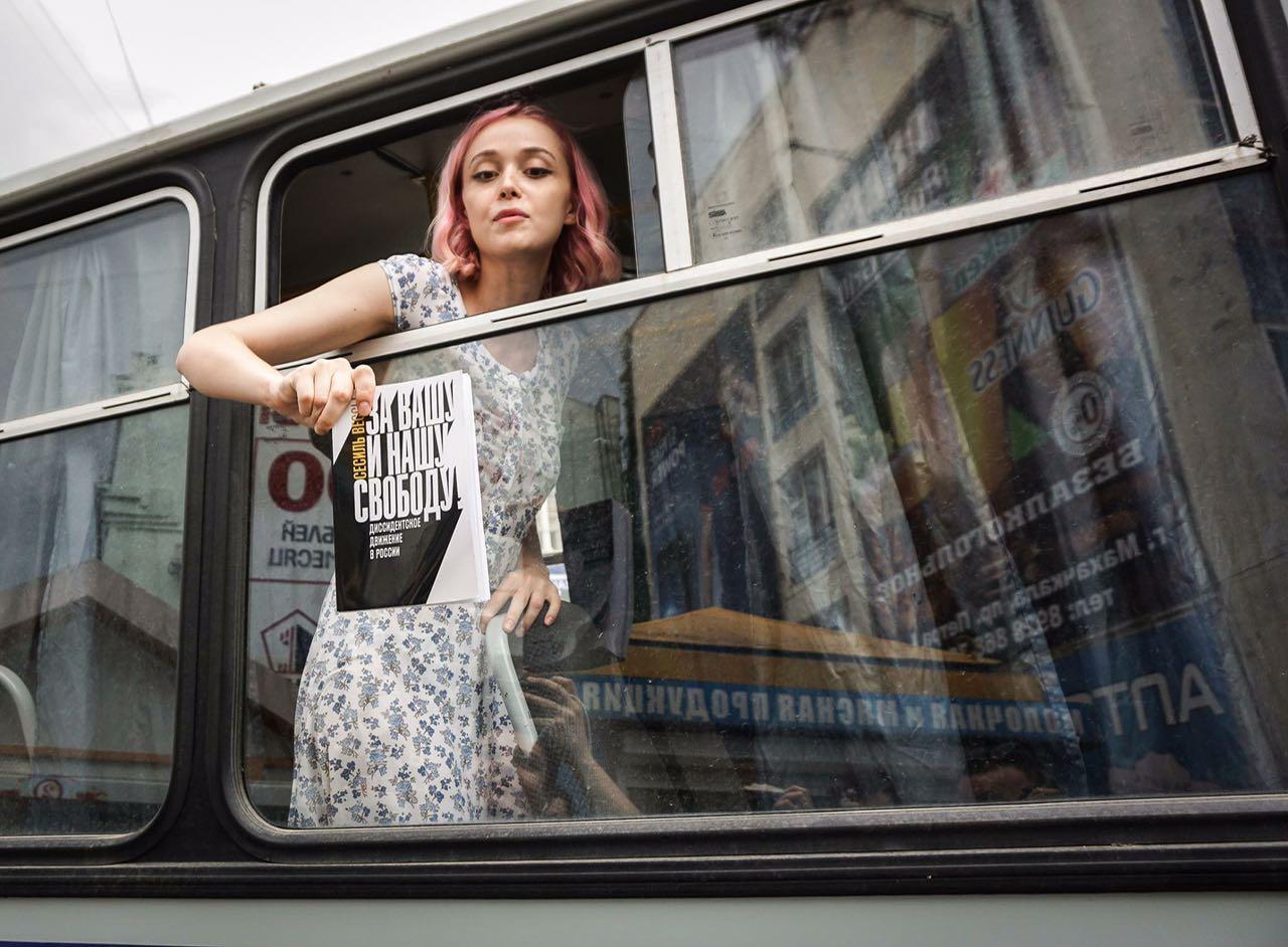 Olga Tochenaya on a police bus during anti-corruption protests in Russia