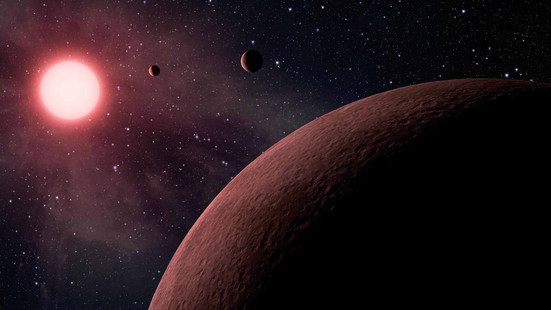 An artist’s concept of a planetary system discovered by Kepler, called KOI-961. 