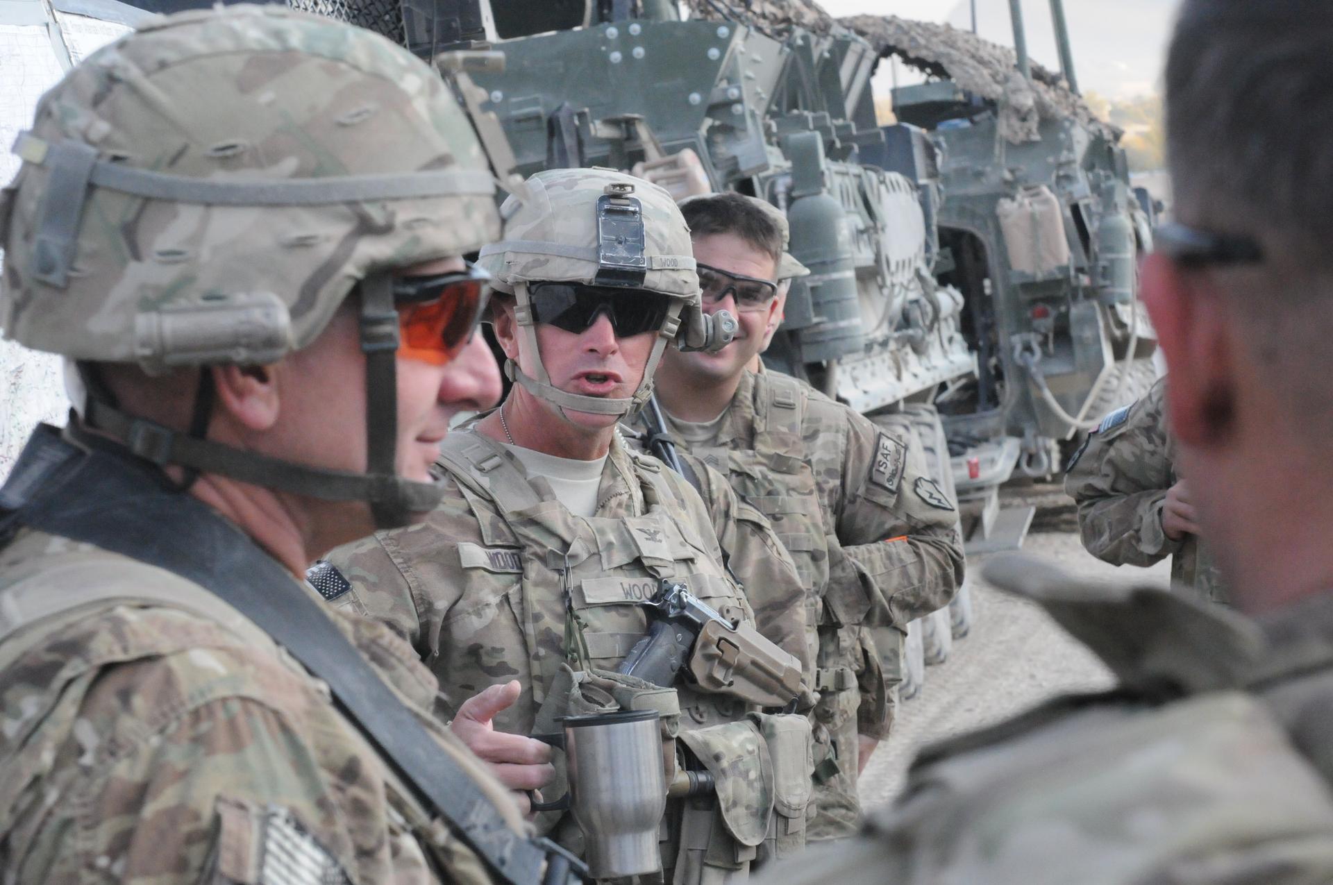 Col. Todd Wood, then commander of 1st Stryker Brigade Combat Team, 25th Infantry Division, talks with soldiers at FOB Masum Ghar in Kandahar province, Afghanistan in 2011.