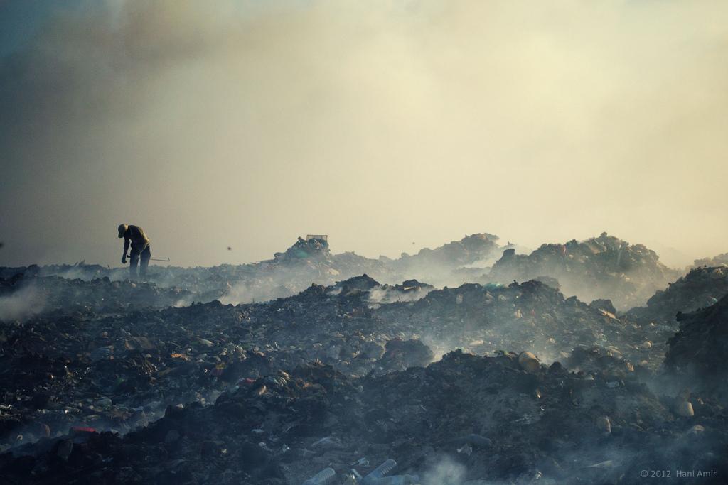 An immigrant laborer working in a landfill on Thilafushi, the island used for waste disposal in the Maldives.